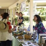 People talking at the San Damiano Table