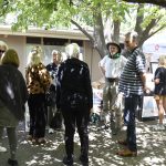 Folks connecting on the patio during EarthFest