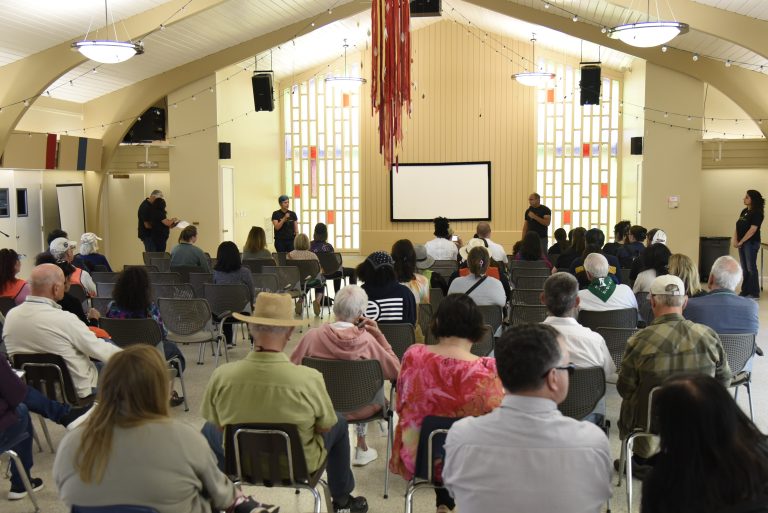 Rewire Community members presenting in the Parish Hall